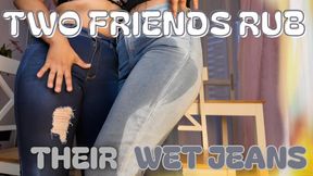 TWO FRIENDS RUB THEIR WET JEANS