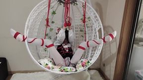 Tied up in a floral egg chair getting her holes wrecked rough BDSM style