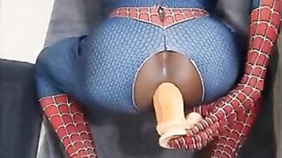 Spiderman cums while riding massive dildo