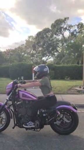 Bonnie public flashing while riding motorcycle