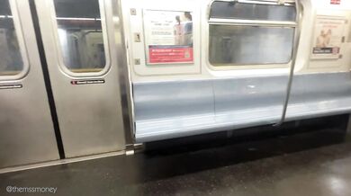 Hot brunette pops collar on NYC subway cumshot