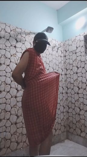 Indian handsome young gay boy is bathing with towel