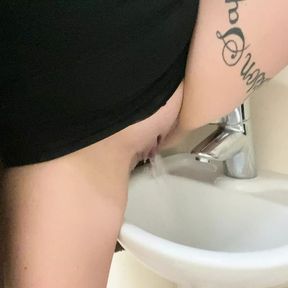 Classy pisses in the sink in the disabled public toilet