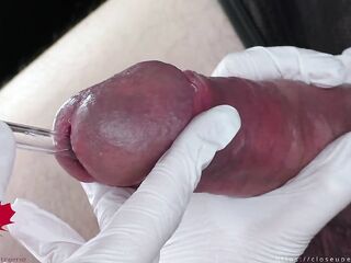Ideal extraction of jizz directly from the urethra. Close-up of the glass straw sounding.