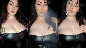 Smoking an all white cigarette in my tight leather dress