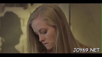 Lovely legal age teenager gal plays with a toy