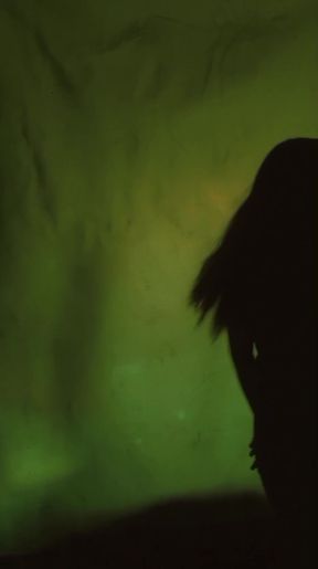 Dark romance in a candlelit room