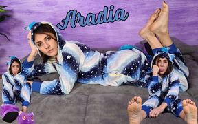 Stunning Aradia in a One-piece Hooded Pajama and Purple Slippers