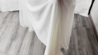 Feet in a wedding dress. preview