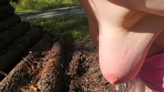 Milking udders in open street