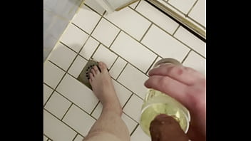 Gay faggot takes glass of piss