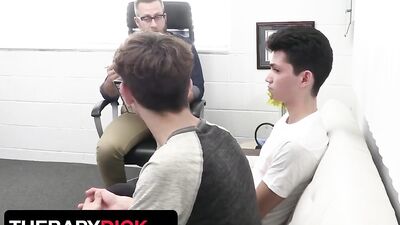 Two naughty twinks fuck on the couch in front of teacher