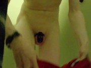 Frustrated chastity boy in the locker room of a swimming pool