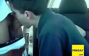 Sucking a cock seated in his car