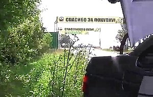 Girl sucks in the car on the roadside