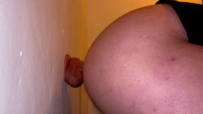 Twink fucking big dildo in public bathroom doggy style