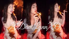 Smoking in Orange Velvet Dress