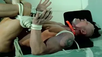 Bound muscular stud takes electro play and anal toy domination