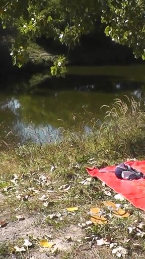 Captivating moment from &quot;Outside, nature, by the river, naked MILF has wild masturbation&quot;
