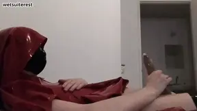 Condom cum in red latex hooded swing dress and face mask masturbation