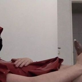 Condom cum in red latex hooded swing dress and face mask masturbation