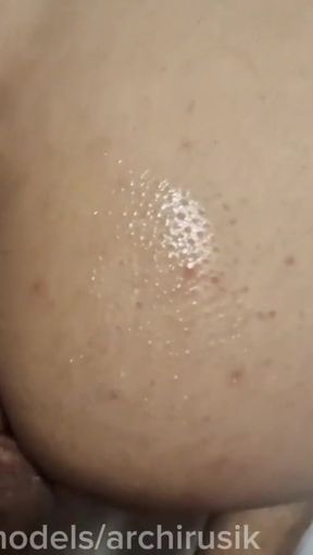 A long-legged femboy with a big dick gets fucked in his wet holes by daddy until he cums after a shower.   Clip 2