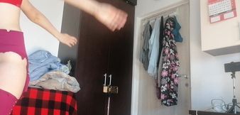 Sexy Latina Having Fun Trying on Clothes and Cutting Them