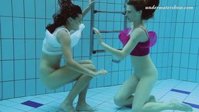 Russian nymphs Lera and Sima show off their tight bodies in the pool
