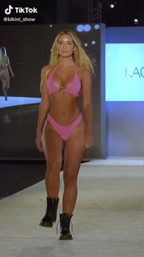 Fashion show model strutting runway