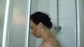 The Dildo Play While Taking Shower in Nylons