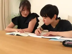 Seductive Japanese MILF in Stockings Shows Off Her Skills with a Hot Foot Job