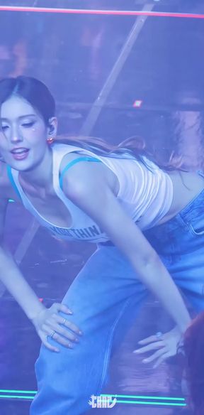White girl bounces her big tits in a k-pop inspired dance