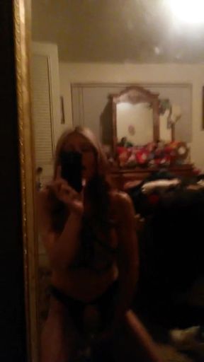 Hot wife plays in the mirror.