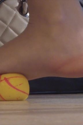 Nyllady Squeezes Rubber Balls Massaging Her Hosed Feet
