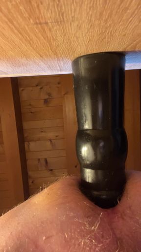 Grandpa fucks himself with his black BDSM dildo