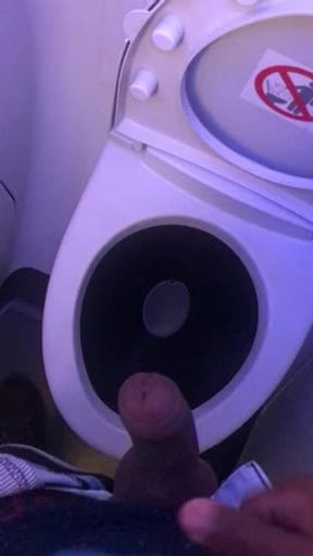 Leo cumming in the plane bathroom