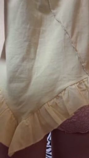 Tiny yellow dress reveals pussy