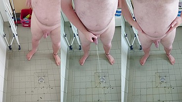 Nacktes Urinieren in der dreckigen Dusche
