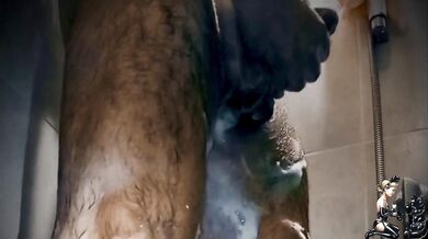 A pleasant combination of shower and handjob!