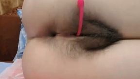 Girl masterbates with anal plug and anal balls on cam