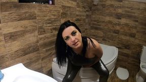 ripped shiny nylon jumpsuit in the bathroom. cum cleanup, dirty dancing and pee play