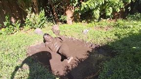 Mud play in jeans and button down blouse