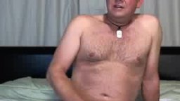 Daddy Bear strokes and takes charge of his bitch bottom