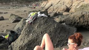 fucking and a vibrator in the ass on the beach with people