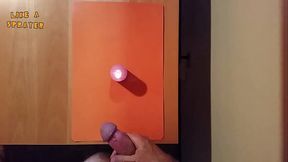 Cumshot on a candle by amateur handjob like a sprayer