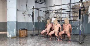 Senior man whips his young male slaves and plays with their dicks in a hot orgy