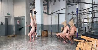 Senior man whips his young male slaves and plays with their dicks in a hot orgy