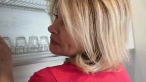 Seductive MILF neighbor grabs spread on the kitchen counter