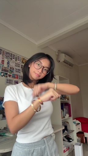 Big-titted Indonesian cutie shows off her cute tits