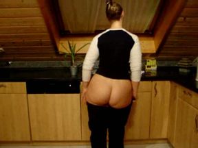 Blonde wife exposes her gigantic booty while making a breakfast